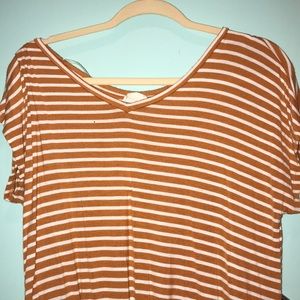 Orange and white striped top
